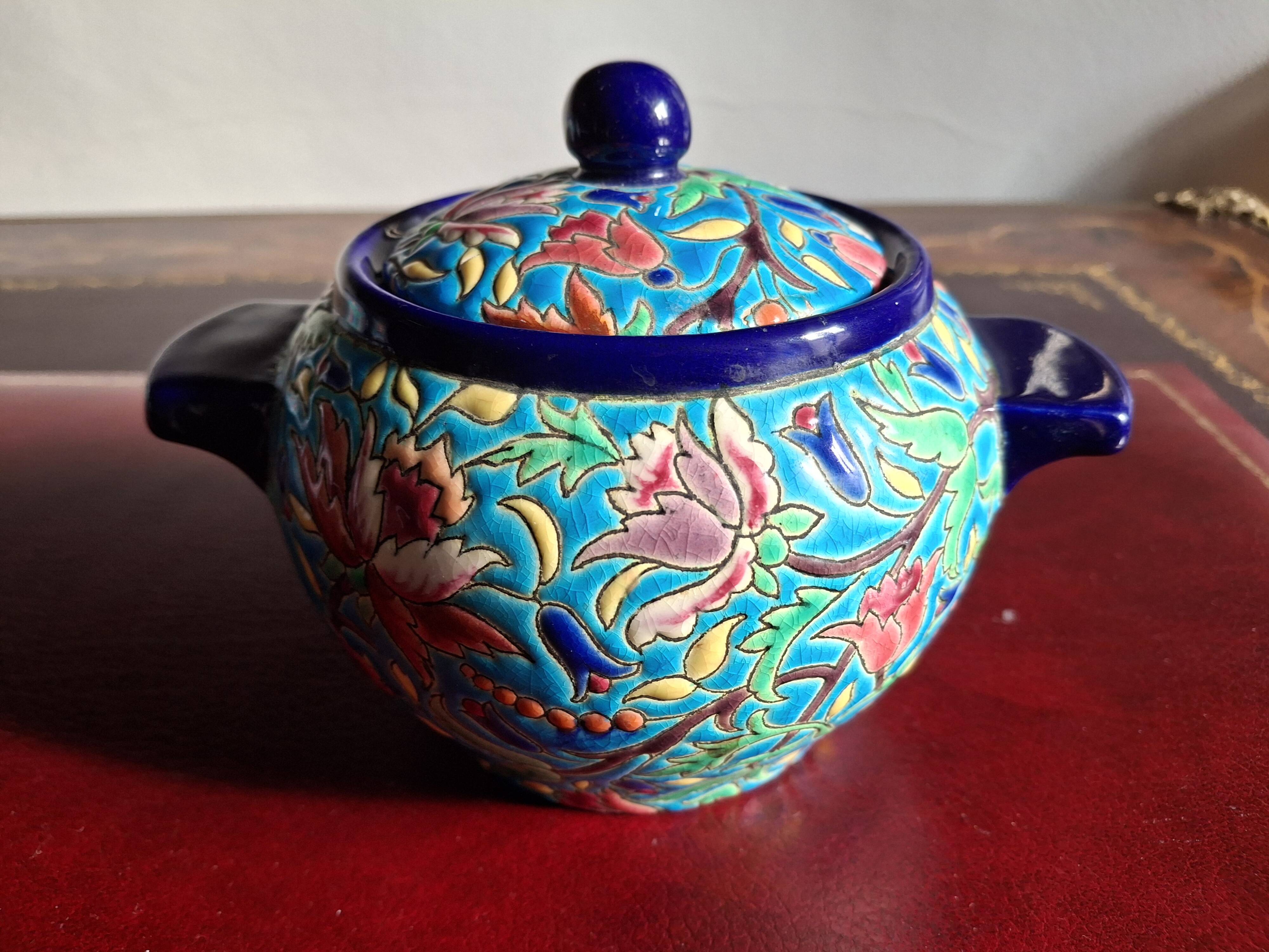 Cloisonné enamel tea service from Longwy in excellent condition.