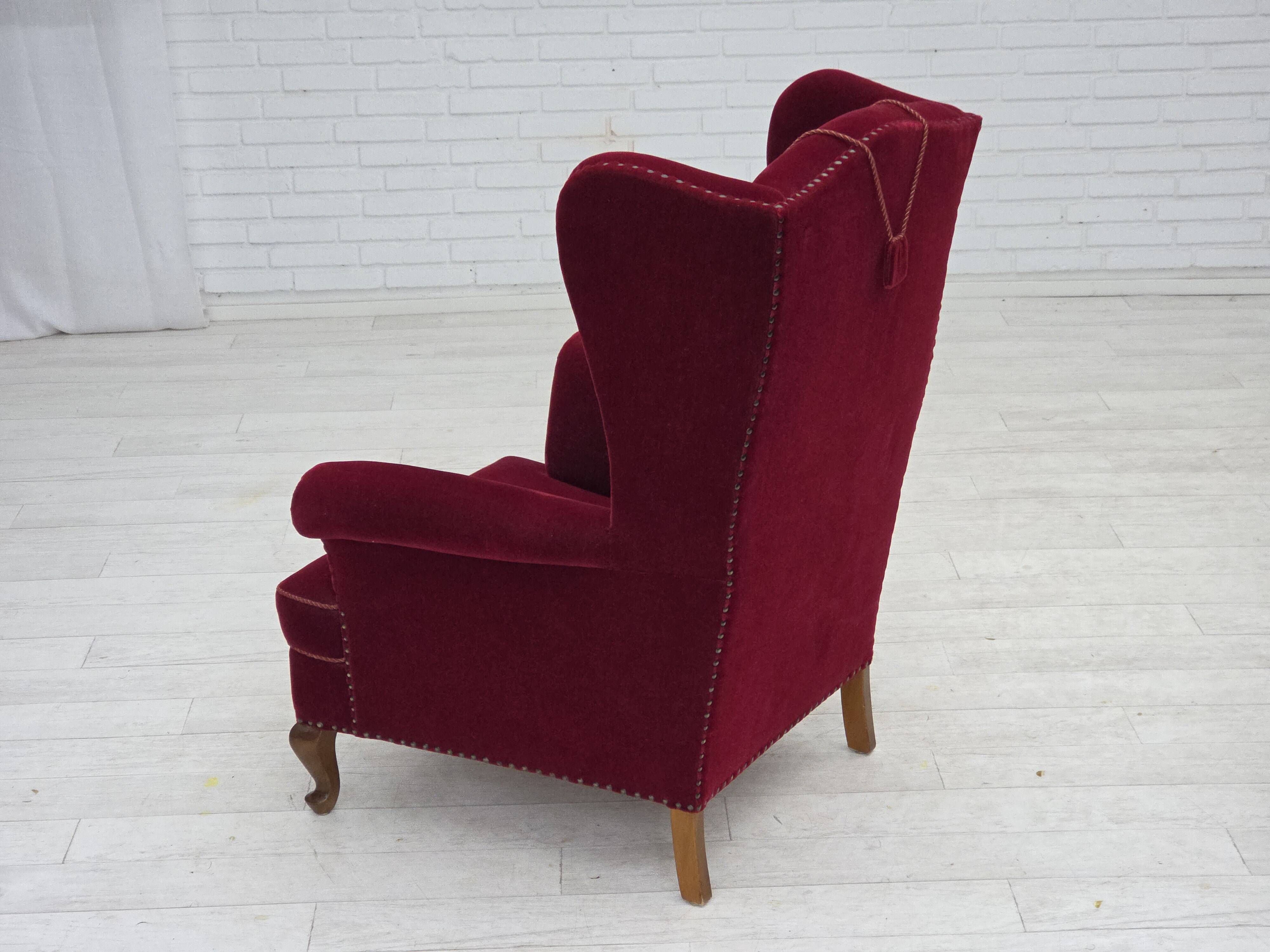 1960s, Danish highback wingback armchair, cherry-red furniture velour.