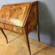 Louis XV slant-top desk in 18th-century marquetry.