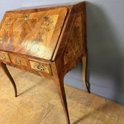 Louis XV slant-top desk in 18th-century marquetry.