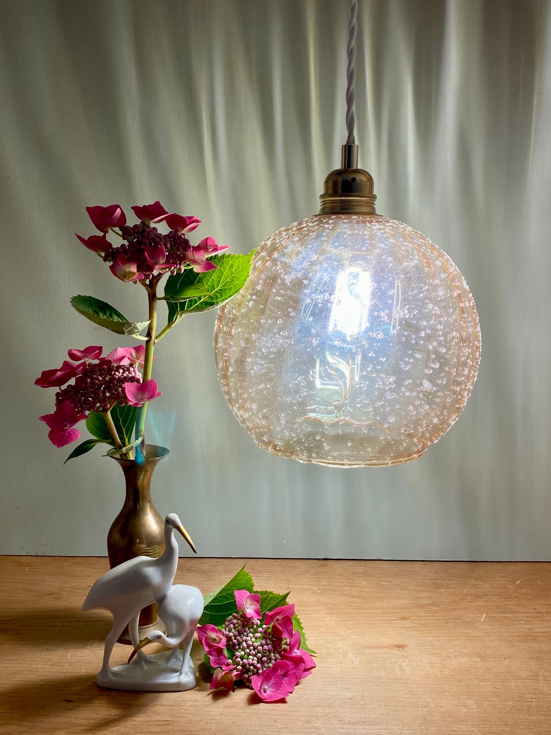 Vintage globe pendant lamp in amber glass