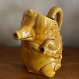Pig slip pitcher