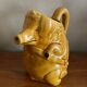 Pig slip pitcher