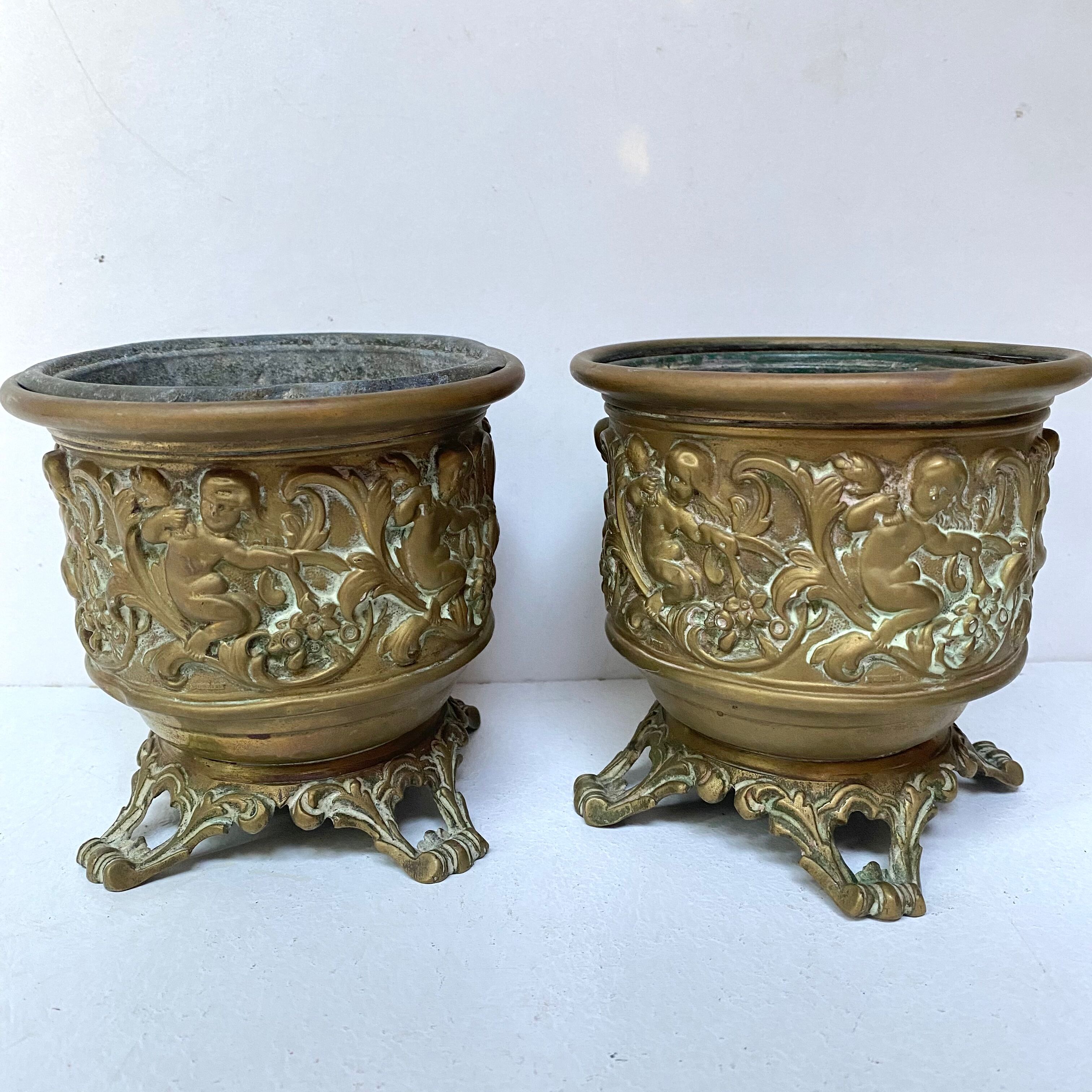 Pair of caches pots in brass repelled nineteenth century