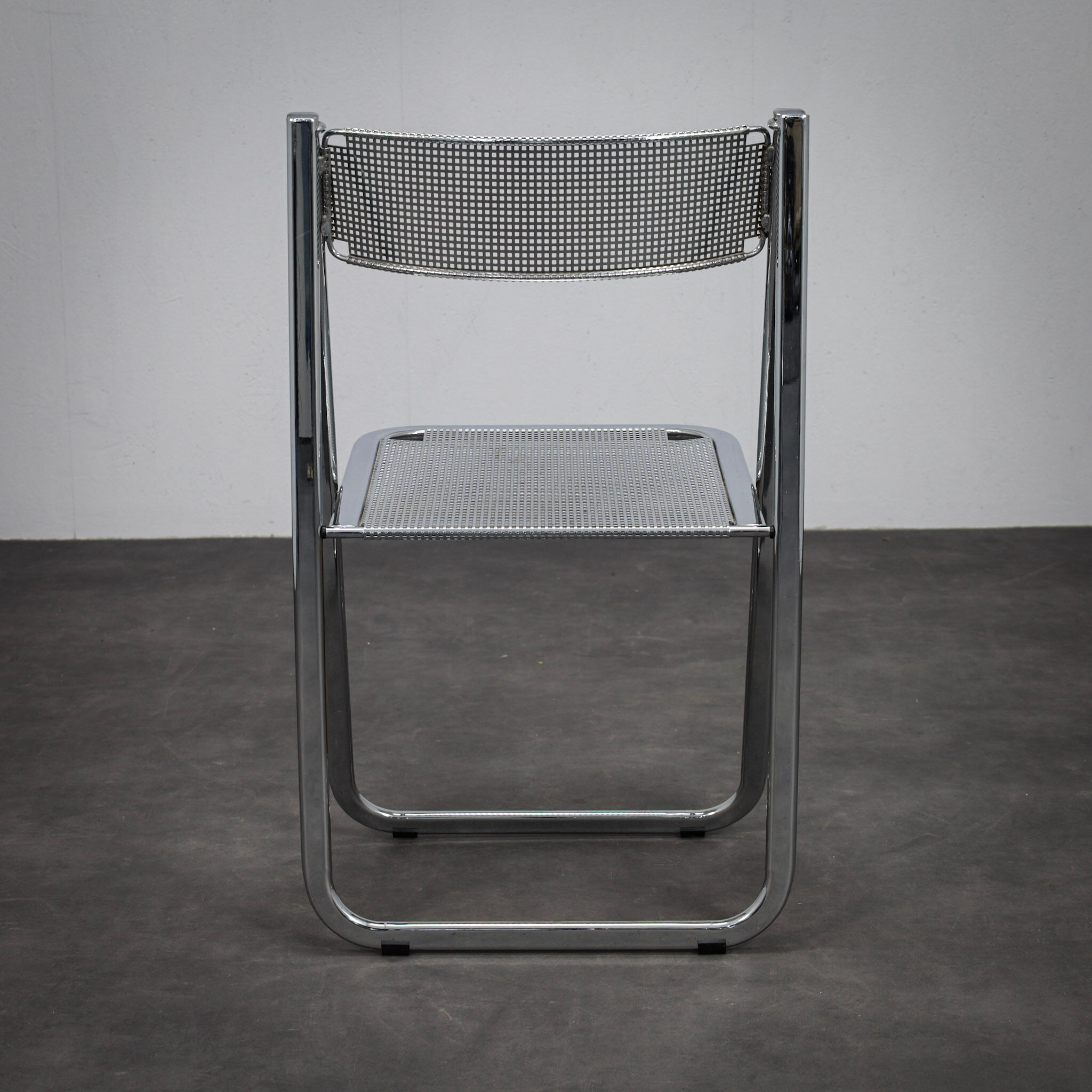 "Tamara" perforated metal folding chair by Arrben Italy (1980s)