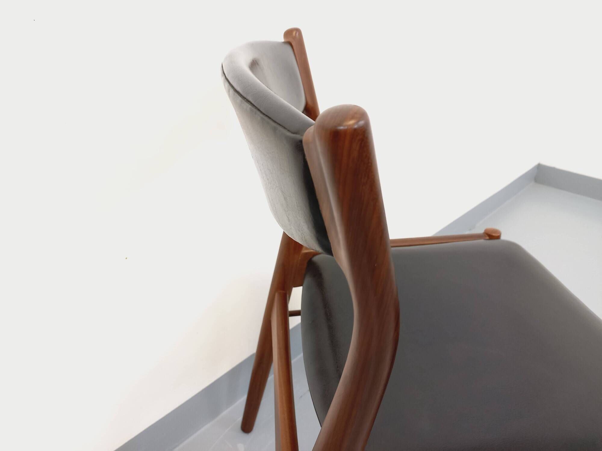 Vintage Scandinavian teak and leatherette chair from the 50s and 60s