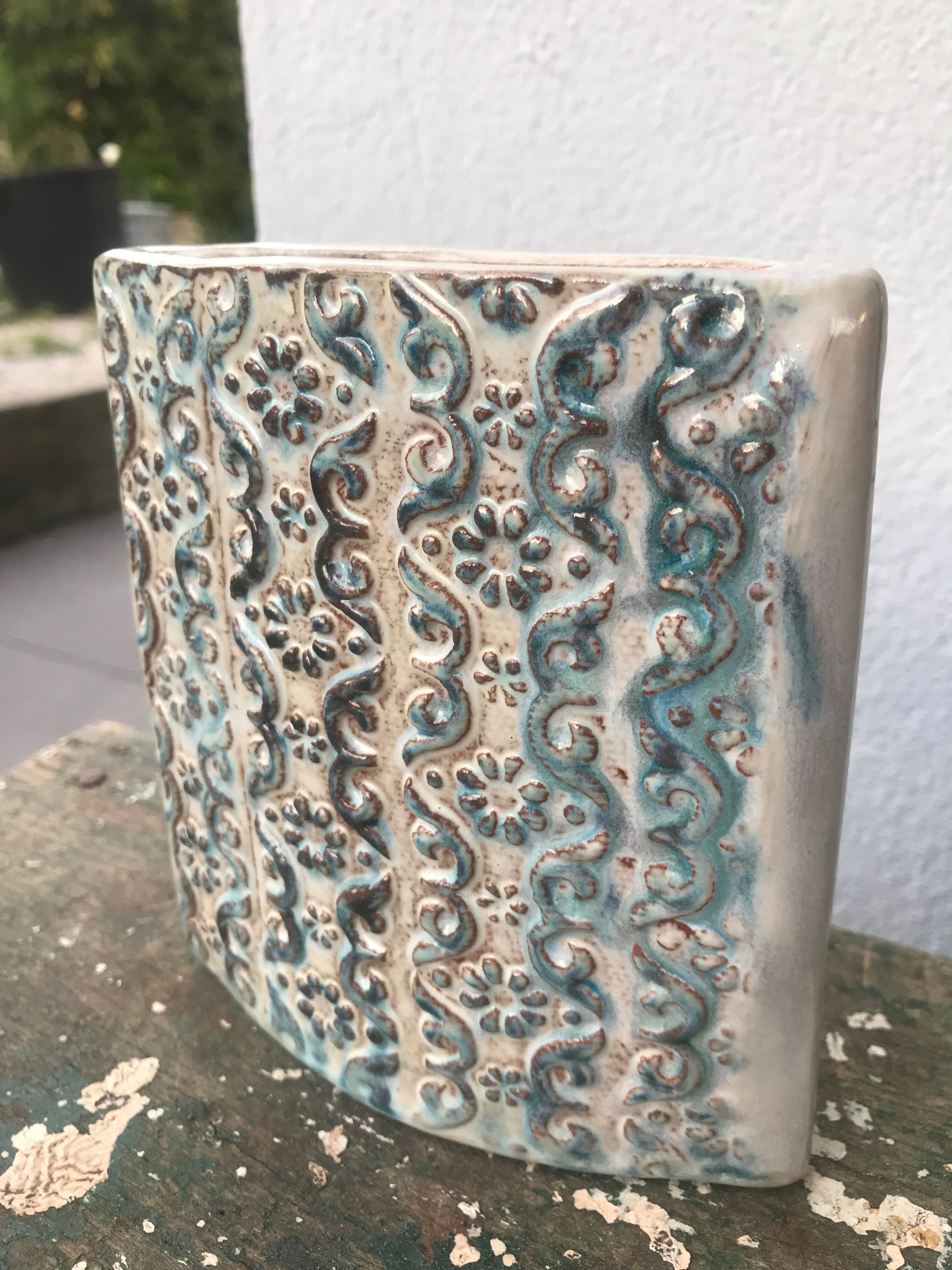 Vintage ceramic vase, decorated relief