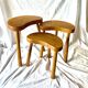 Trio of solid wood "bean" coffee tables