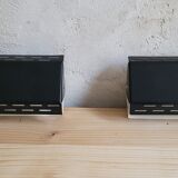 Pair of wall sconces with adjustable shutter