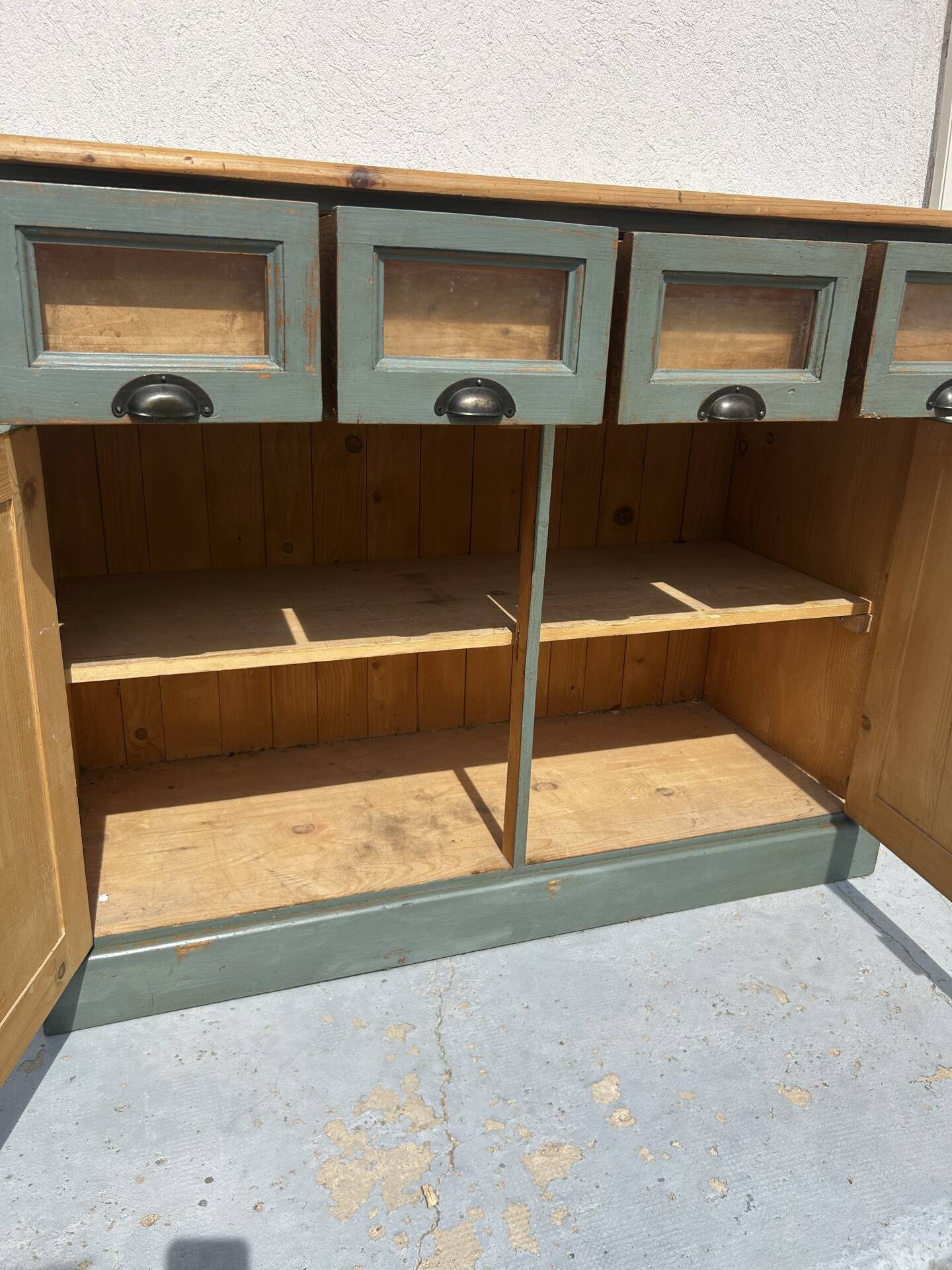 Antique counter cabinet with drawers and label holders – green patina