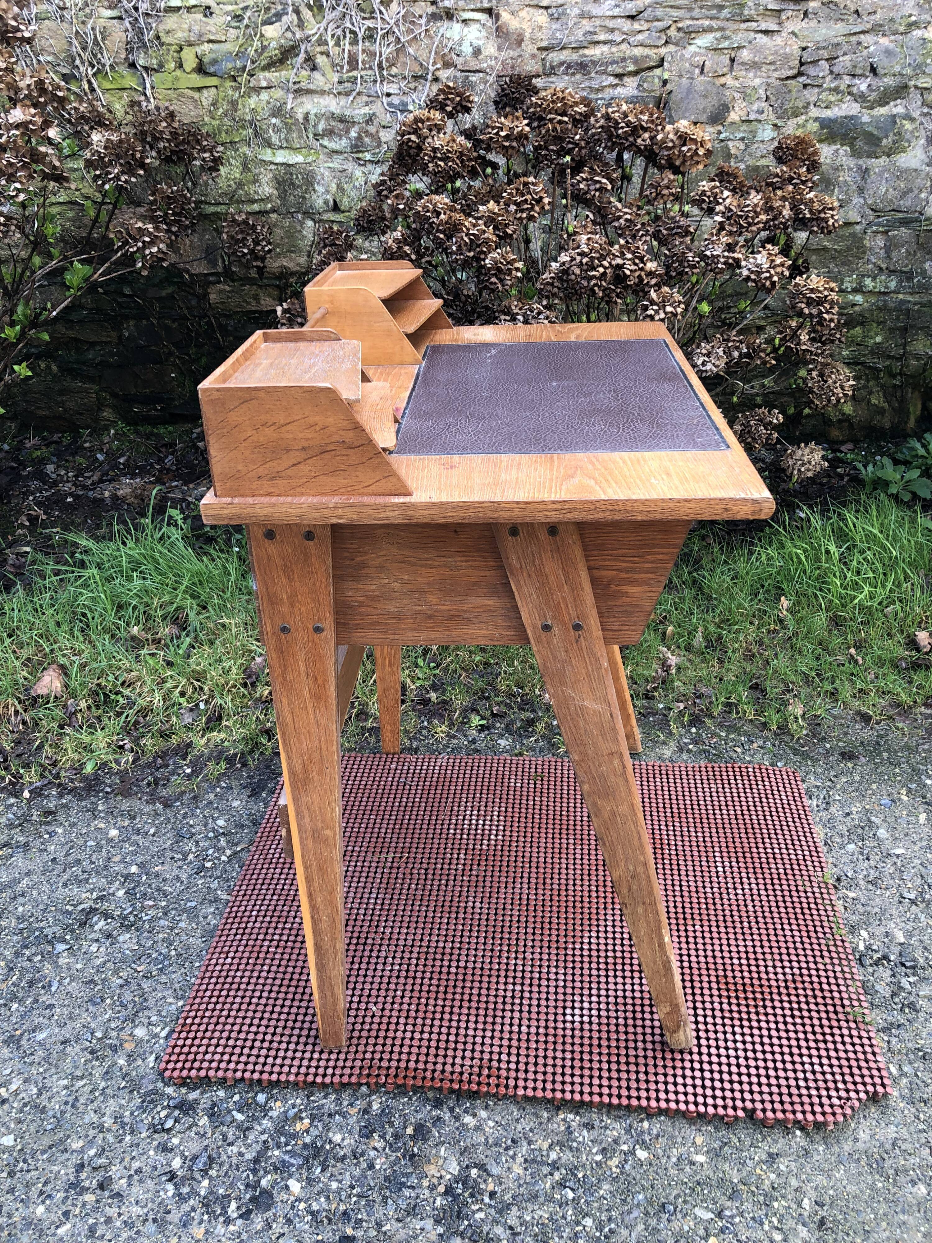 Vintage oak compass leg desk.