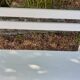 Old garden bench with cast iron feet and wooden planks
