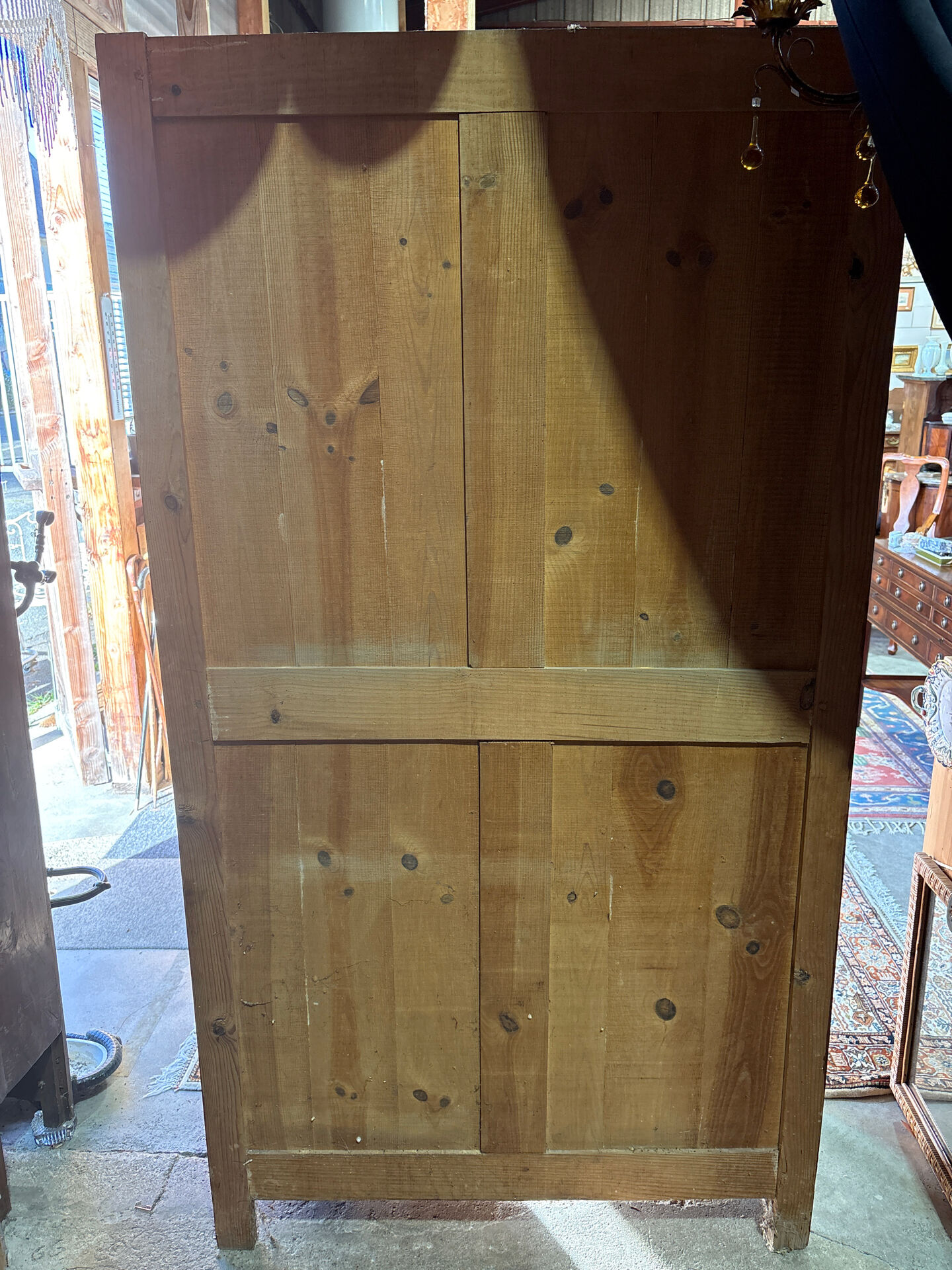 Antique Parisian wardrobe with mirror, hanging space and drawers.