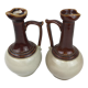 Antique handmade pitchers in beige and brown enamelled terracotta