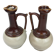 Antique handmade pitchers in beige and brown enamelled terracotta