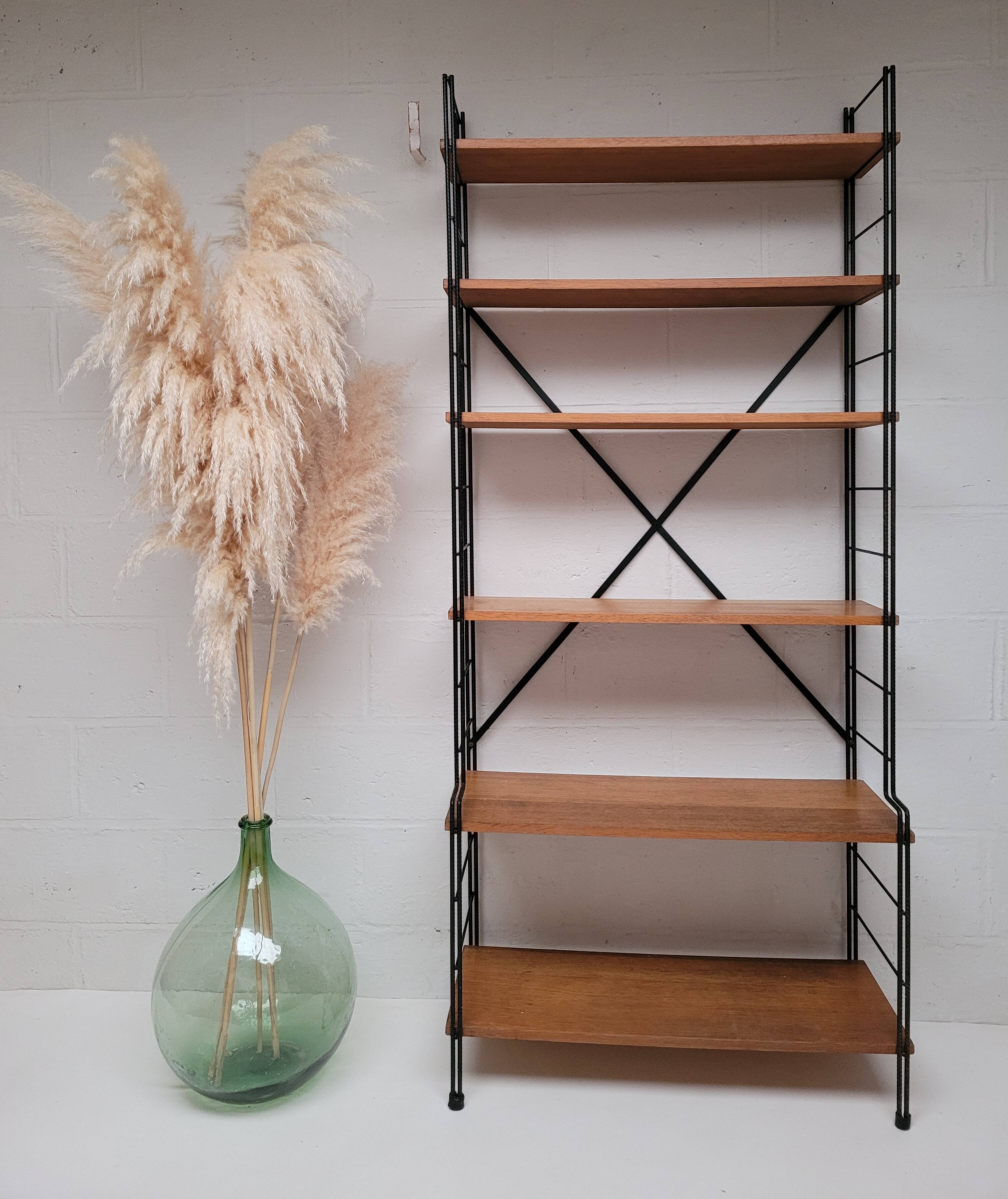 String bookcase on legs from the 50s