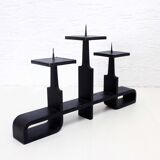 Modernist cast iron candle holder