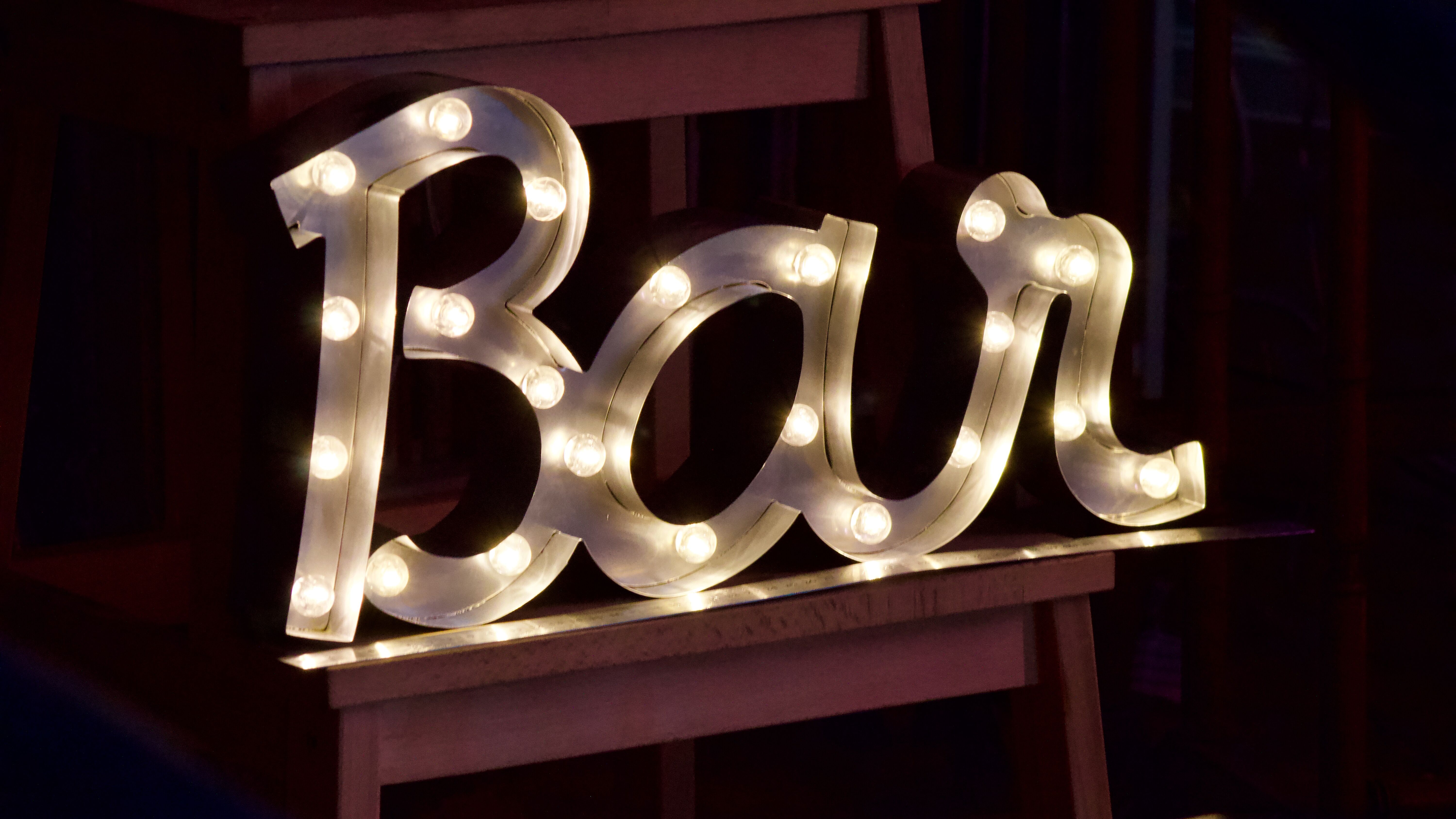 Ancient Light Sign in aluminium lettering forming the word "BAR"