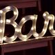 Ancient Light Sign in aluminium lettering forming the word "BAR"