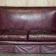 Victorian Knole canapé restored in leather with feather cushions.