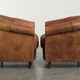 Sturdy set of vintage sheepskin club armchairs with a great appearance