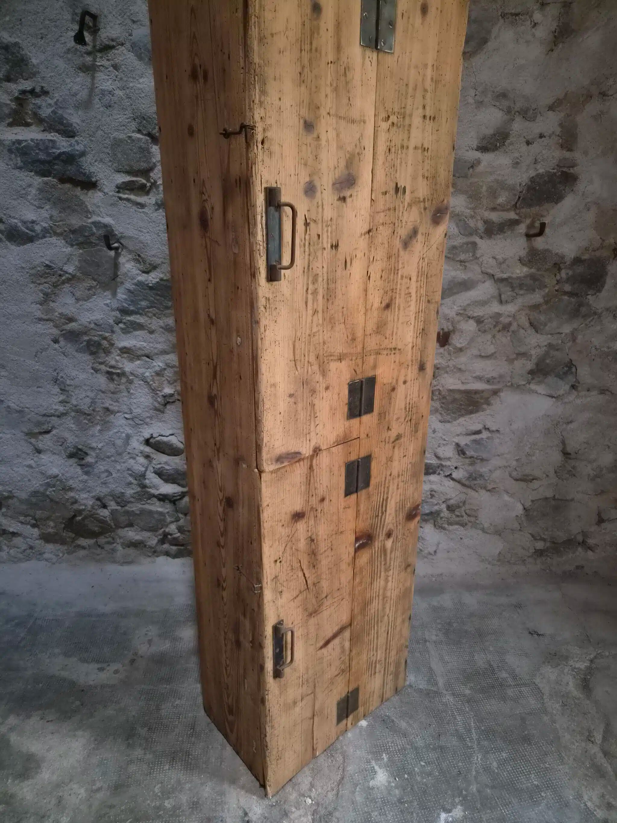 Antique French workshop cabinet in pine with compartments.