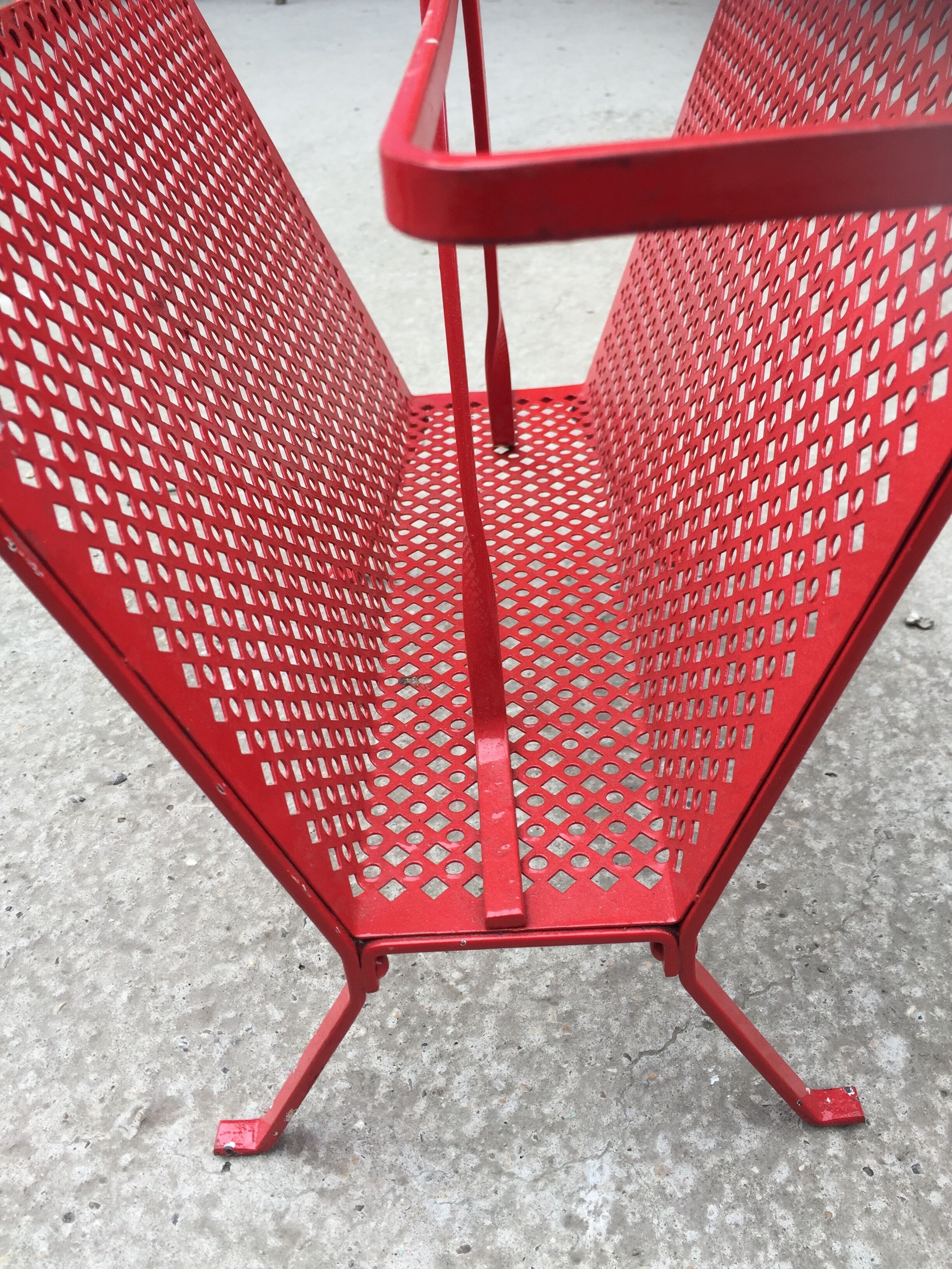 Red metal magazines holder 50s