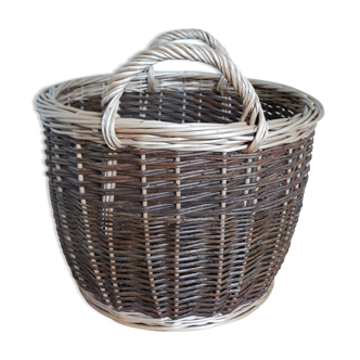 Very large round basket in two-tone braided wicker with handles