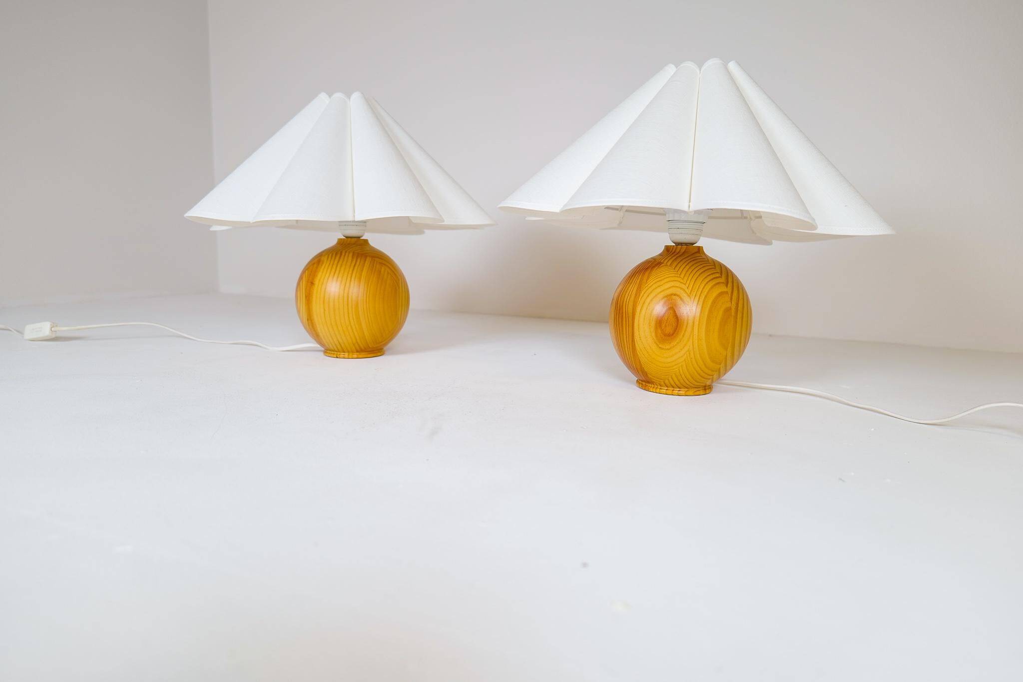 Sculptural modern table lamps from the mid-century in solid pine, Sweden, 1970s.