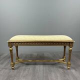 Antique gilded wooden bench in Louis XVI style, 19th century.