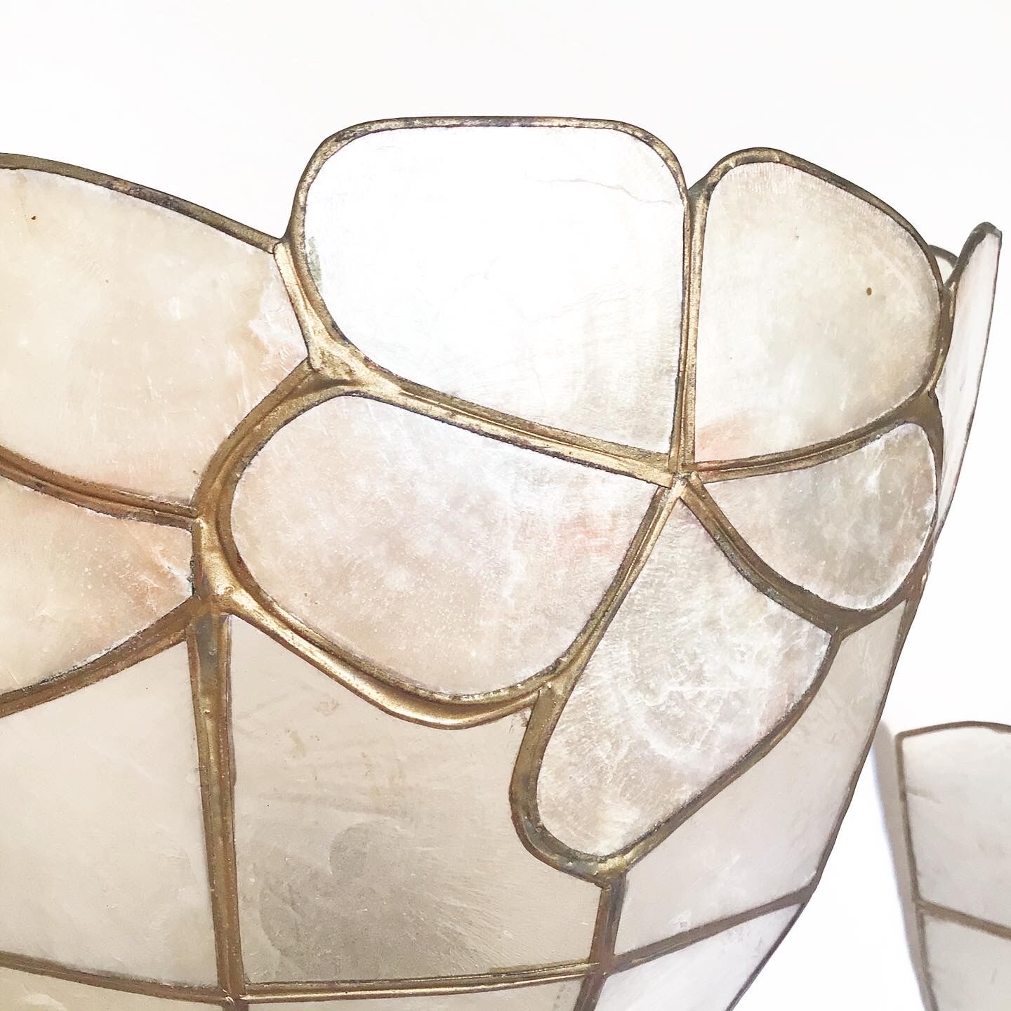 Trio of mother-of-pearl wall lamps