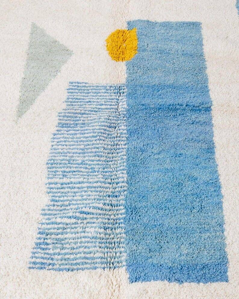Wool rug with colourful patterns, size 150/250 cm.