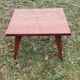Coffee table of the 50s in blond mahogany inlaid compass feet