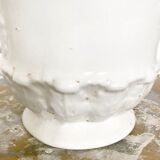 Vintage covered pot in white earthenware molded with lions and friezes
