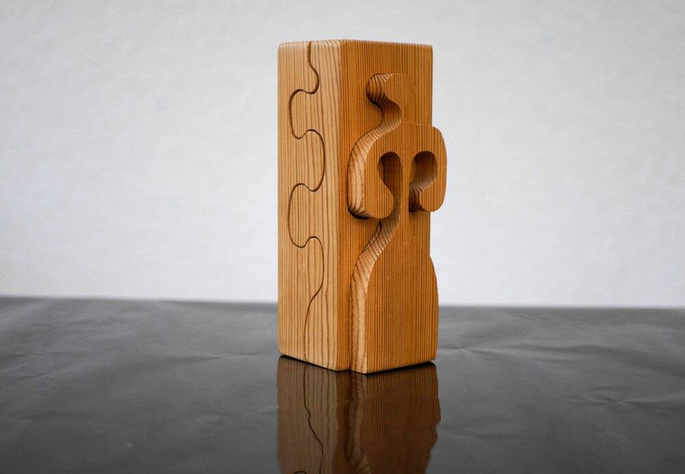 Puzzle in wood sculpture by Gunnar Kanevad for Gamla Linköping, Sweden, 1962.