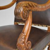 Louis XIII office armchair in leather and walnut carved around 1860
