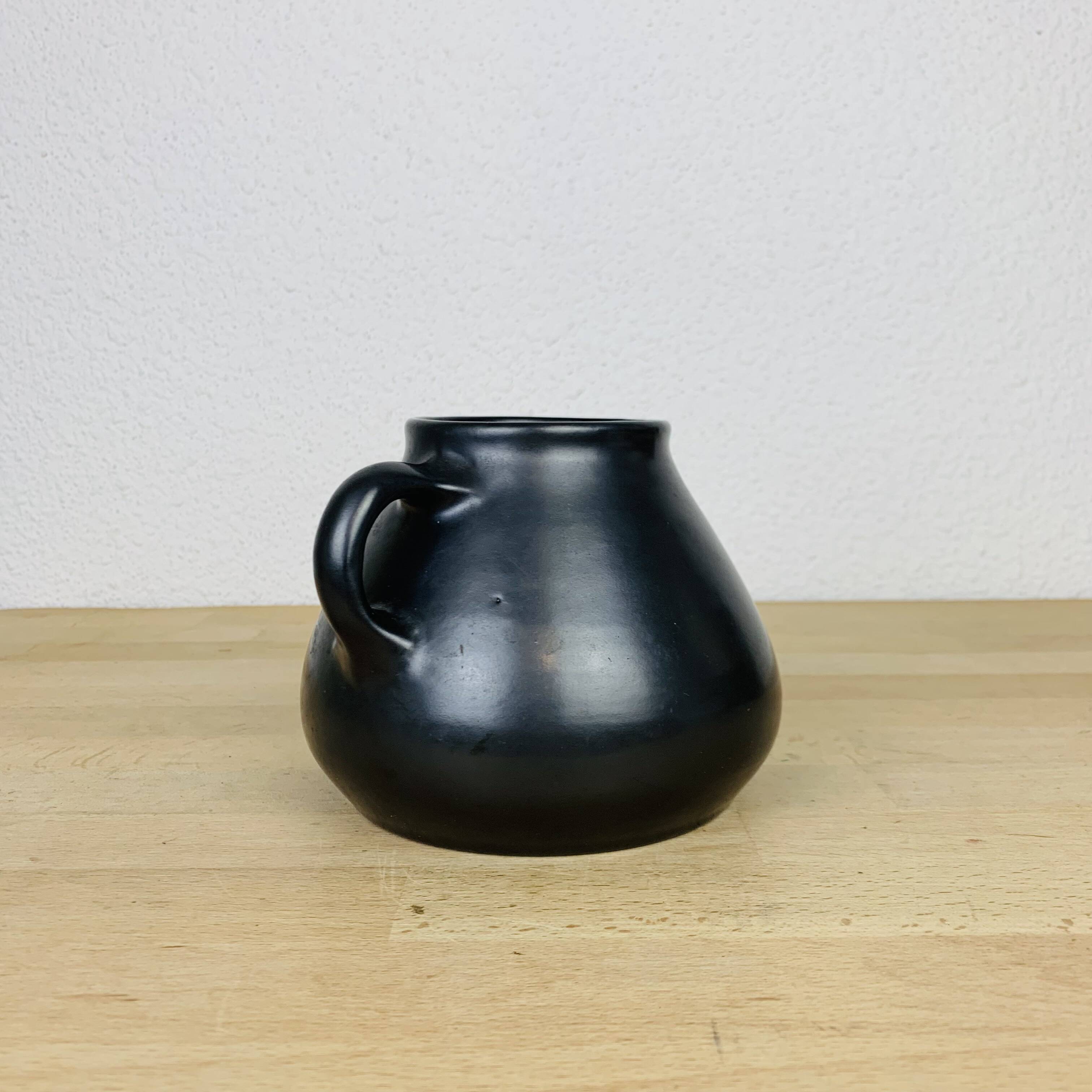 Black ceramic pot-bellied vase from the 50s