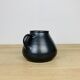 Black ceramic vase from the 1950s.