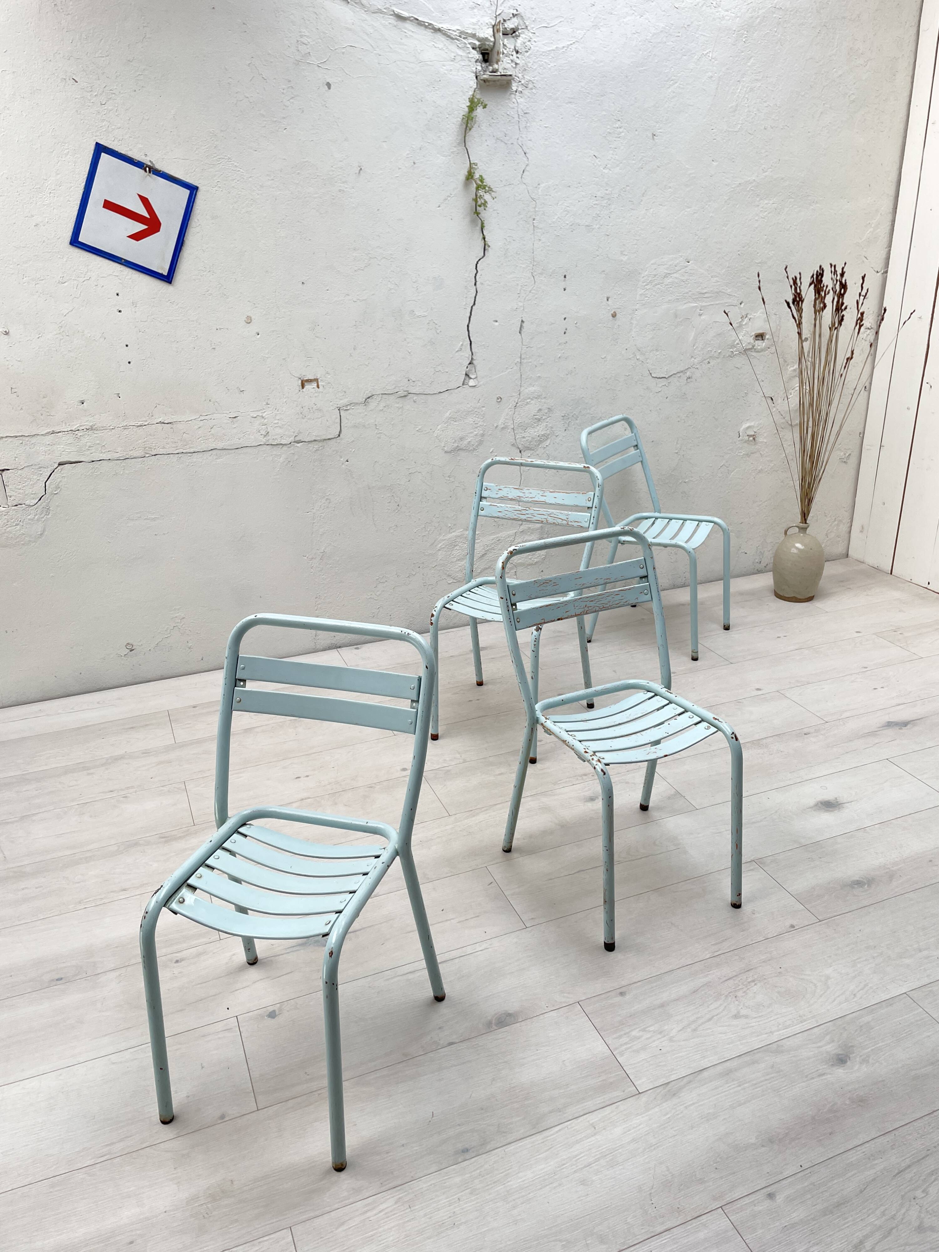 Set of four Tolix T2 chairs, circa 1950.