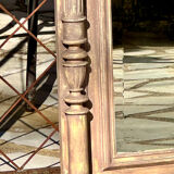 Imposing fireplace mirror in carved and painted wood, 19th century.