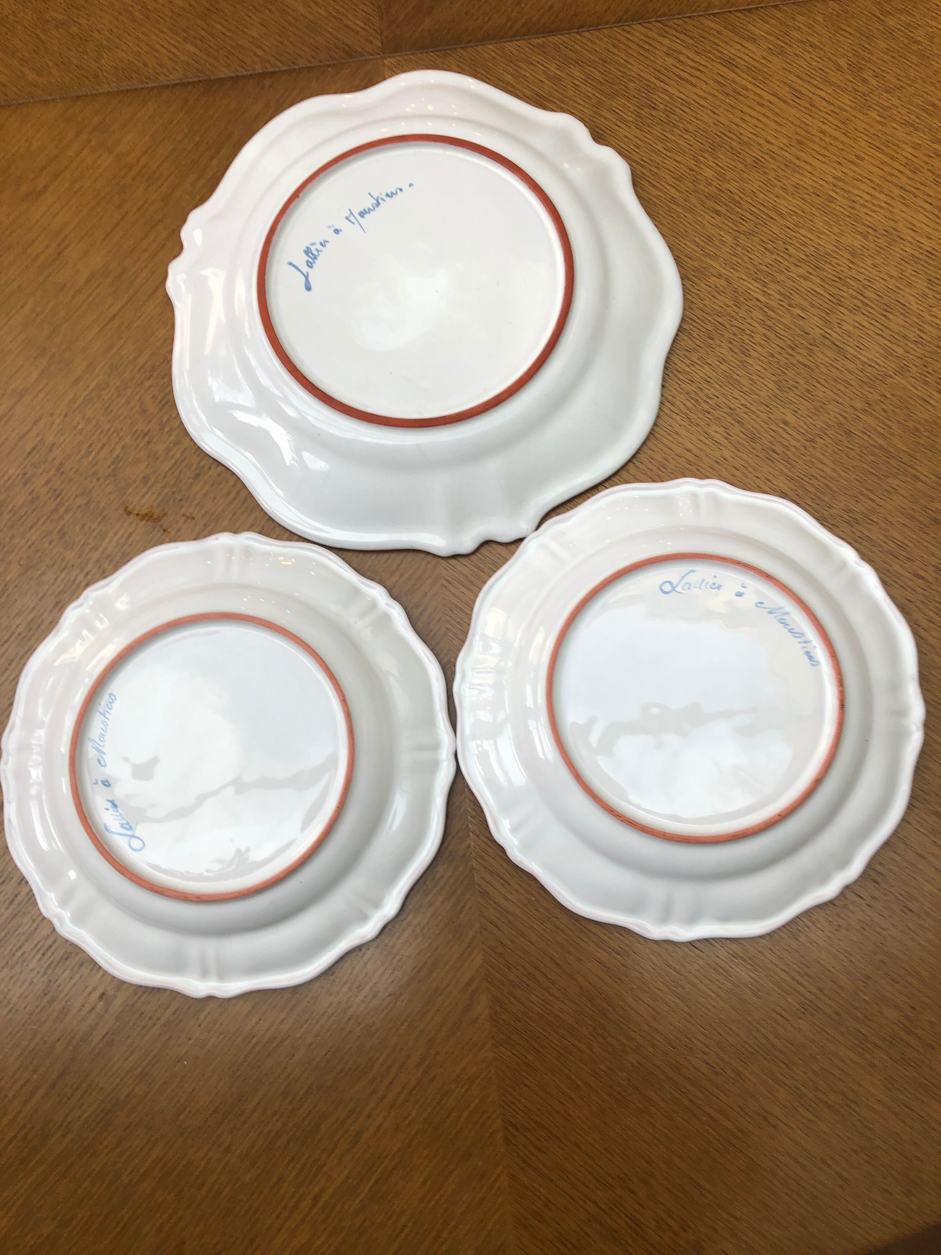 3 signed moustier plates