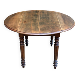 Louis Philippe oval drop-leaf table in solid wood, 19th century
