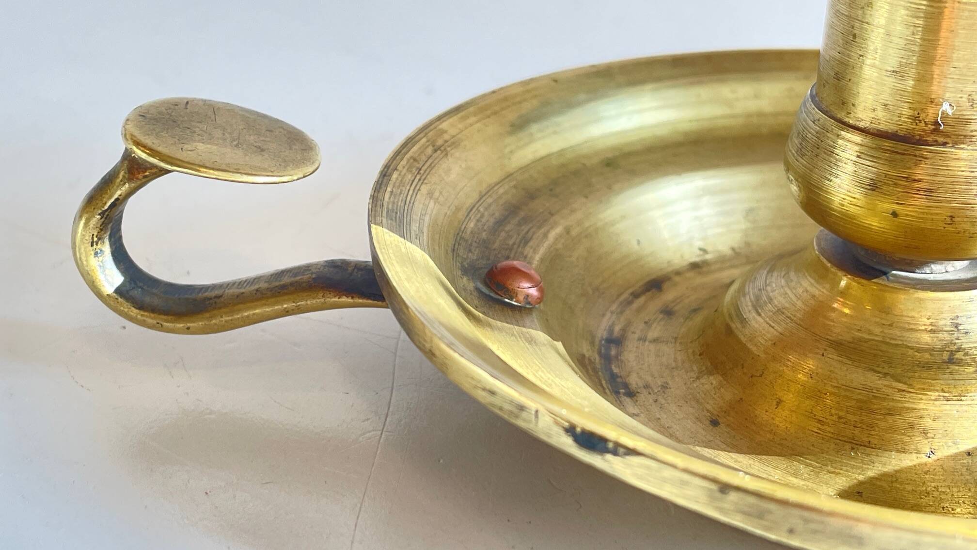 Antique solid bronze hand candlestick