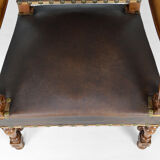 Louis XIII office armchair in leather and walnut carved around 1860