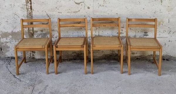 Série de 4 chaises vintage en pin assise cannage