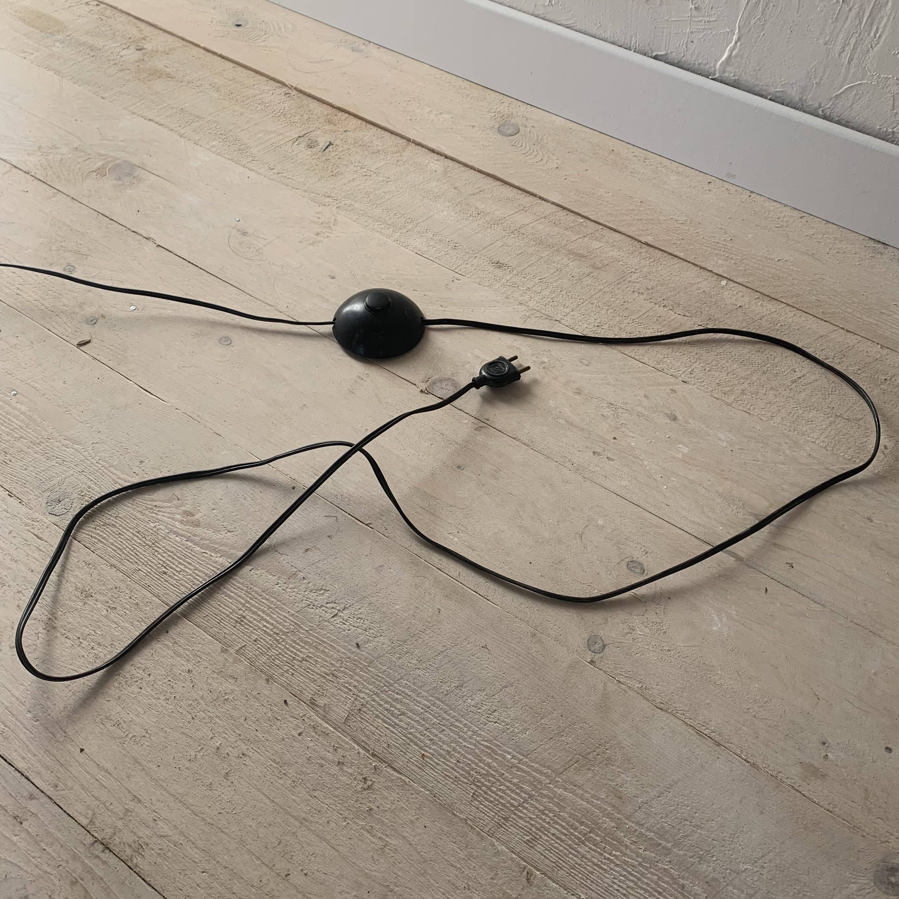 Vintage black metal tripod floor lamp and brass ball