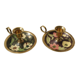 Set of 2 round golden metal candle holders and floral patterns