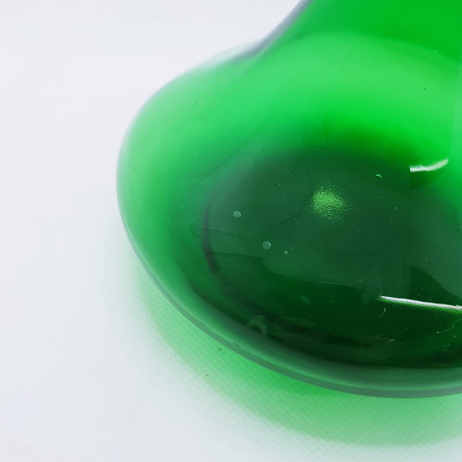 Tall green glass bud vase