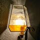 Brutalist pair of wall sconces in hammered glass by Longobard 1970.