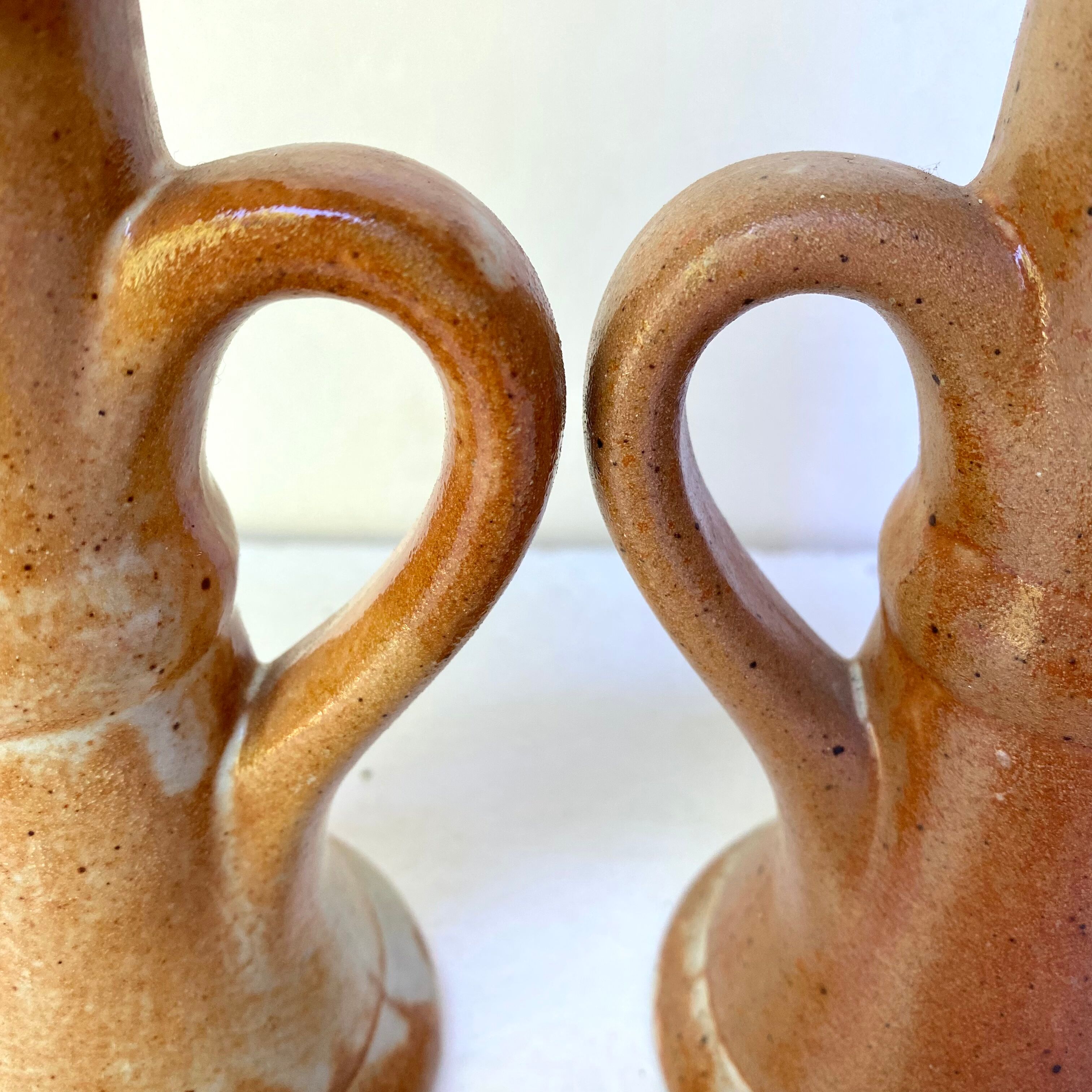 Pair of bohemian sandstone candle holders